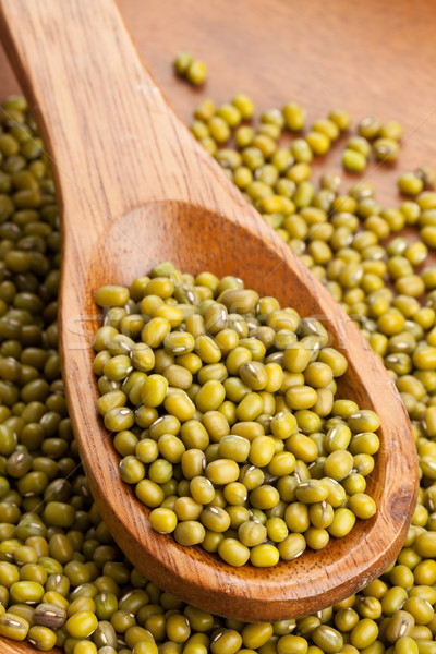 Raw mung beans on spoon Stock photo © ShawnHempel