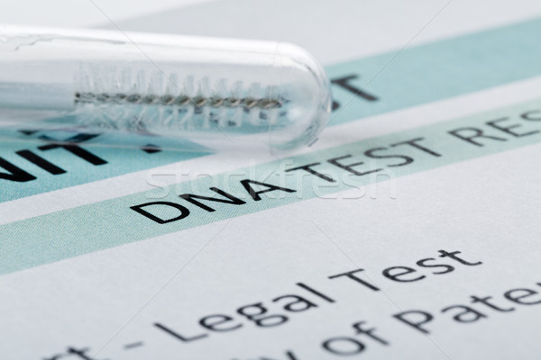 Paternity test result form with buccal swab in test tube Stock photo © ShawnHempel