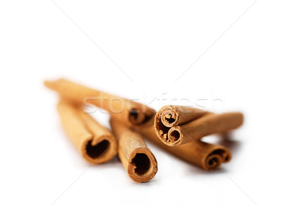 Cinnamon sticks on white Stock photo © shyshka