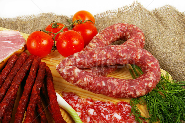 Hús kolbász termékek népszerű étel sok Stock fotó © sibrikov