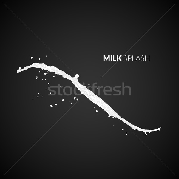 Stock photo: Milk splash, isolated on black background