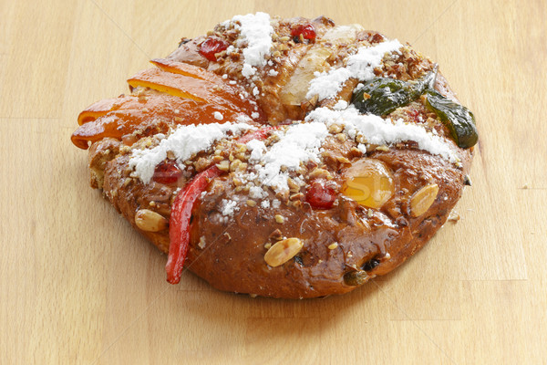 Christmas Bolo Rei or King Cake Over a Wood Table Stock photo © simas2