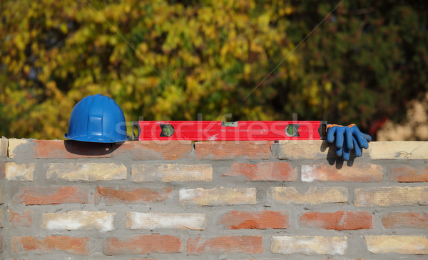 Construction worker equipment at brick wall Stock photo © simazoran
