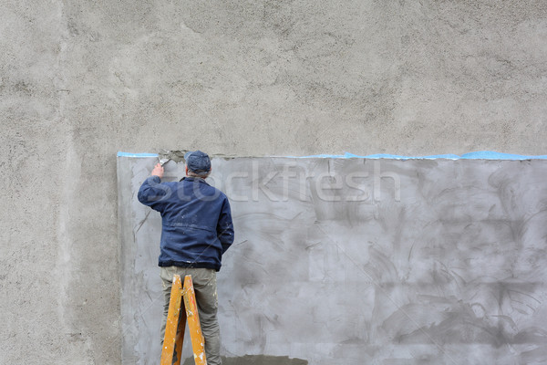 Ev işçi yalıtım duvar adam Stok fotoğraf © simazoran