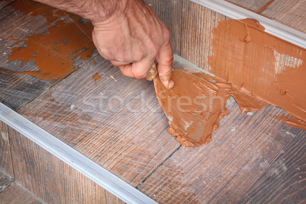 Bouwplaats tegels gezamenlijk werknemer hand man Stockfoto © simazoran