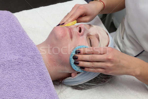 Jóvenes femenino cara tratamiento para la piel crema Foto stock © simazoran