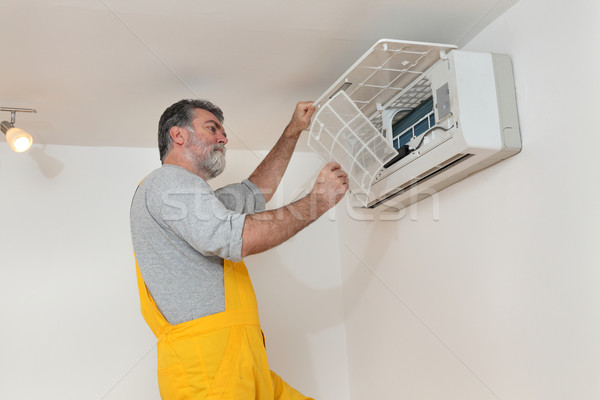 Air condition examine or install Stock photo © simazoran