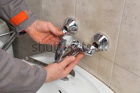 Plombier robinet salle de bain mains robinet d'eau [[stock_photo]] © simazoran