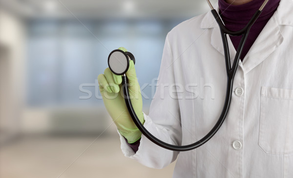 Doctor using sthetoscope Stock photo © simazoran