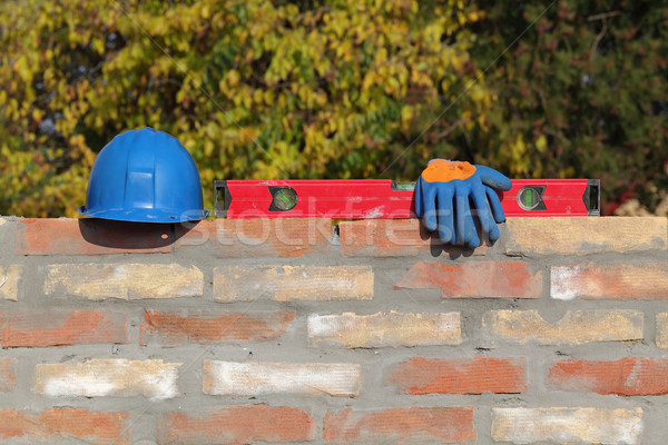 Construction worker equipment at brick wall Stock photo © simazoran