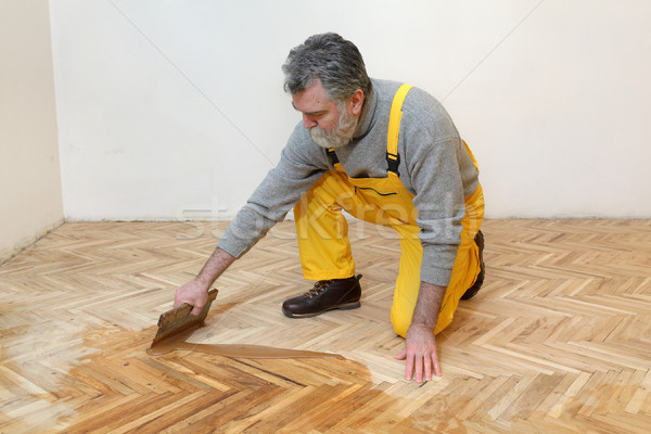 Home Renovation Oak Parquet Varnishing Finish Stock Photo