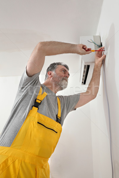 Stockfoto: Elektrische · installatie · airconditioner · elektricien · werk