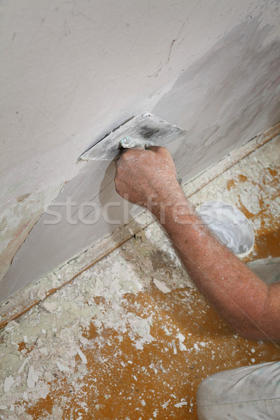 Worker fix damaged wall Stock photo © simazoran