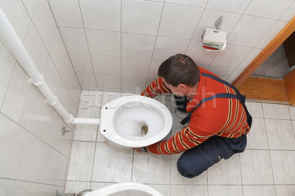 Vízvezetékszerelő törött wc illemhely férfi építkezés Stock fotó © simazoran