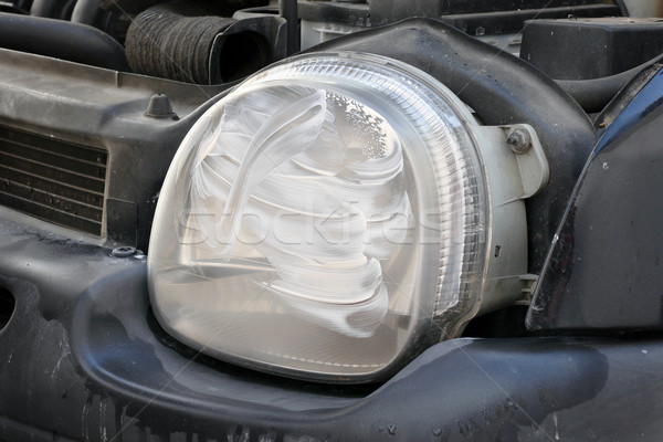 Car light repairing, polishing compound at headlight Stock photo © simazoran