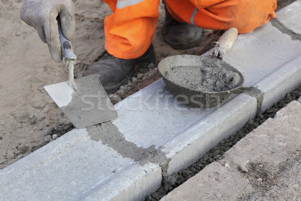 石匠 工人 安裝 石 手 道路 商業照片 © simazoran