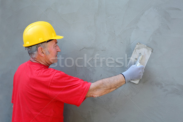 Stock photo: Worker making facade