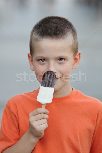 Boy and ice cream Stock photo © simazoran