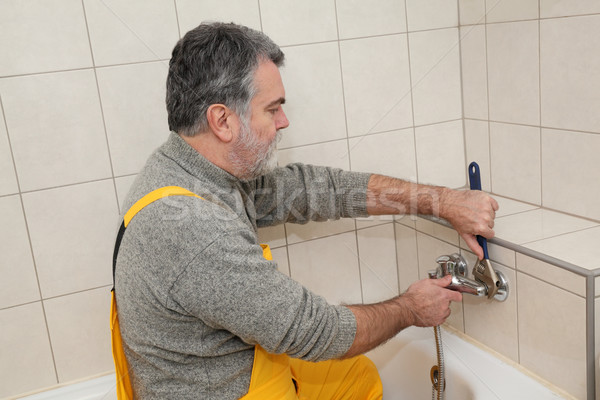 Tesisatçı banyo banyo yetişkin Stok fotoğraf © simazoran