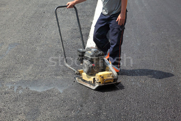 Pracownika budowa dróg drogowego budynku miasta Zdjęcia stock © simazoran