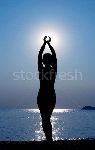 Nina luz silueta jóvenes hermosa niña puesta de sol Foto stock © simazoran