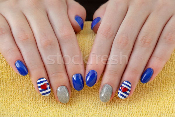 Beauty treatment of fingernails, manicure Stock photo © simazoran