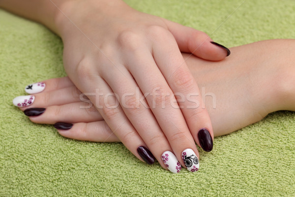 Beauty treatment of fingernails, hands on towel Stock photo © simazoran