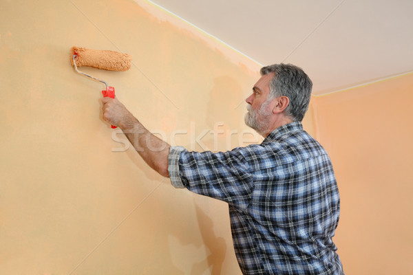 Stockfoto: Werknemer · schilderij · muur · kamer · oranje · verf