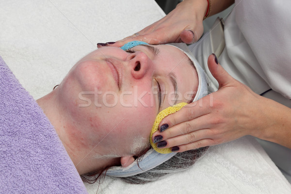 Jóvenes femenino cara tratamiento para la piel crema Foto stock © simazoran