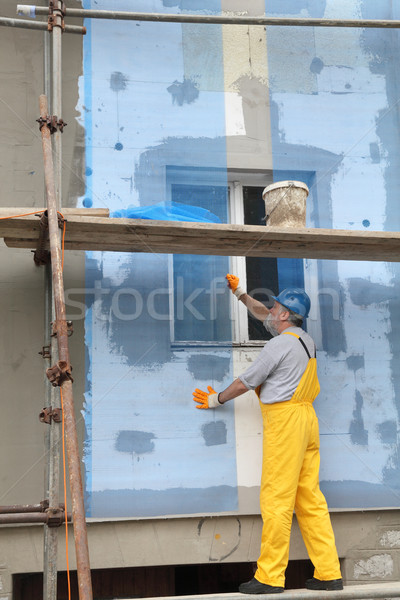 Styrofoam facade insulation, installing mesh Stock photo © simazoran
