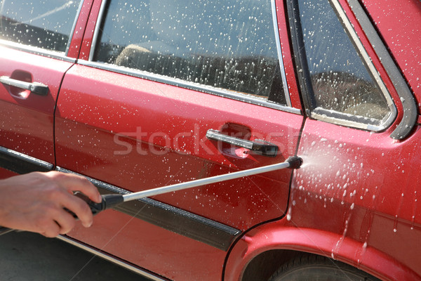 Car washing with sprayed water Stock photo © simazoran