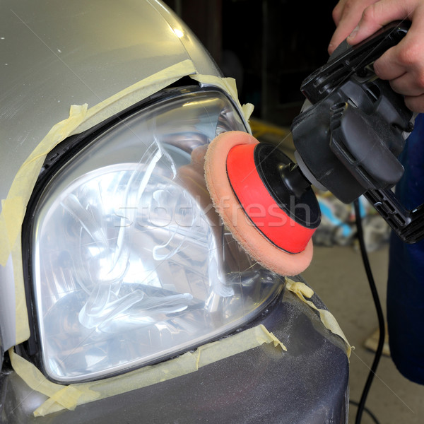 Car light repairing, hand with tool polish headlight  Stock photo © simazoran