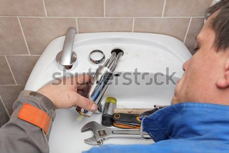 Plombier travaux robinet d'eau salle de bain eau [[stock_photo]] © simazoran