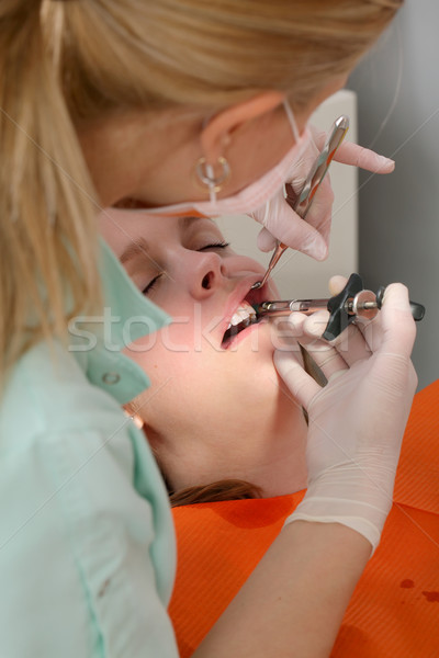 Dental procedure, injection of anesthetic Stock photo © simazoran