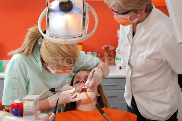 Dental procedure, drilling tooth Stock photo © simazoran