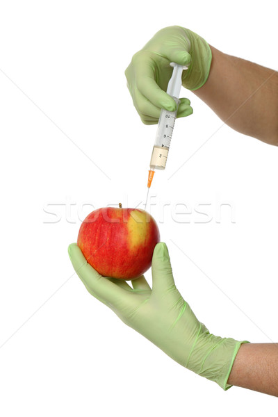 Agricultural concept, apple and syringe Stock photo © simazoran