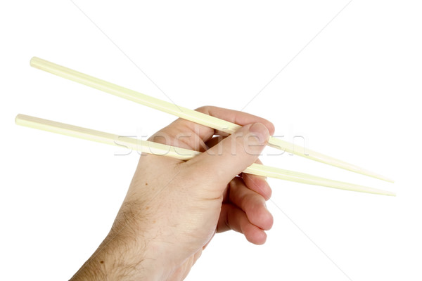 Stock photo: Hand with Chopsticks