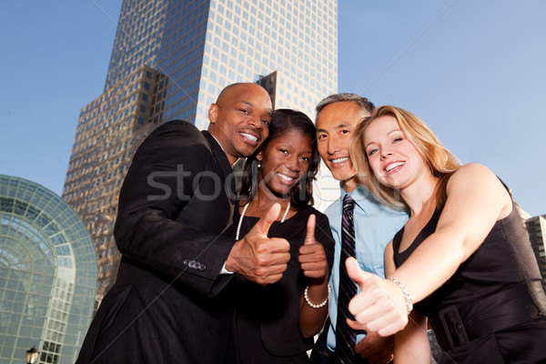 Business groep zakenlieden teken gezicht Stockfoto © SimpleFoto