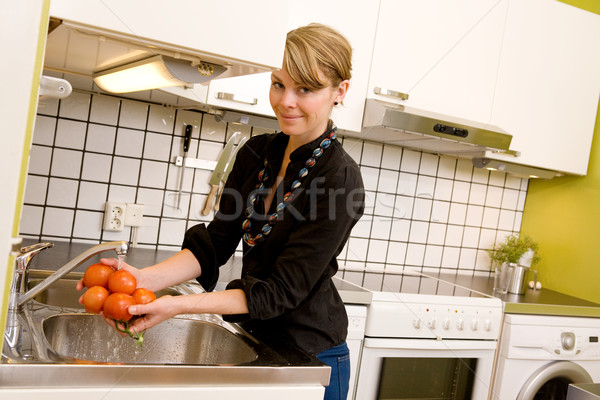 Female Washing Tomatoes Stock photo © SimpleFoto