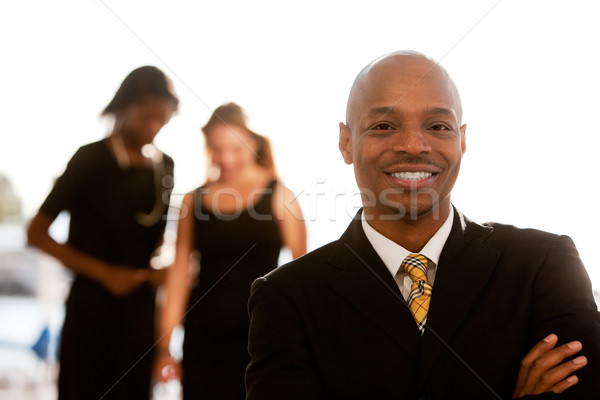 Uomo d'affari african american colleghi sorriso uomo città Foto d'archivio © SimpleFoto