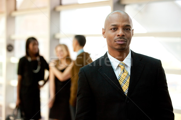 Komoly üzletember afroamerikai férfi csoport portré Stock fotó © SimpleFoto