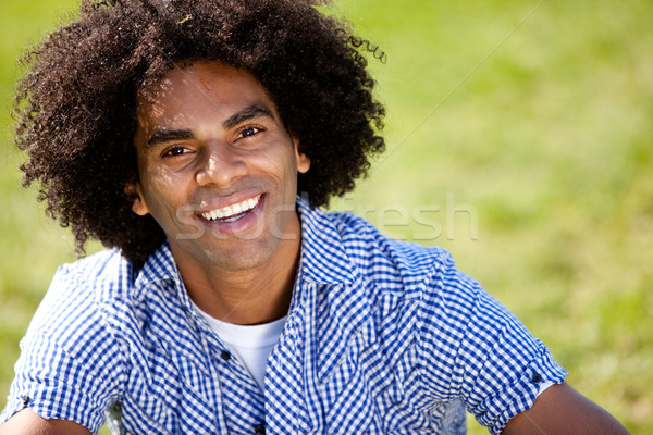 Attrattivo uomo sorridere fotocamera giovane parco Foto d'archivio © SimpleFoto
