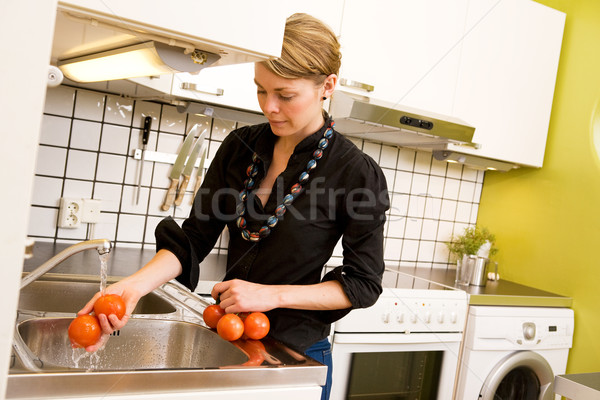 Female Washing Tomatoes Stock photo © SimpleFoto