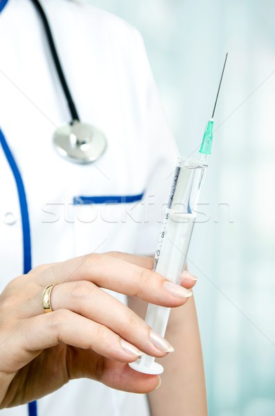Nő orvos kesztyű tart orvosi injekció Stock fotó © simpson33