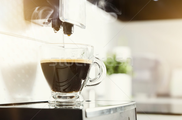 Home professional coffee machine with espresso cup Stock photo © simpson33