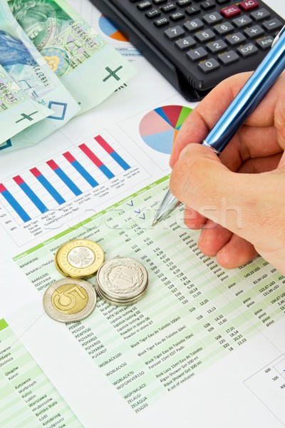 Calculator, pen, coins on a colorful business background Stock photo © simpson33