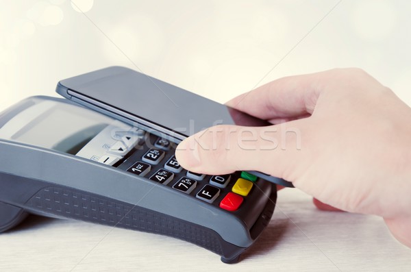 Mobile payment with smart phone Stock photo © simpson33