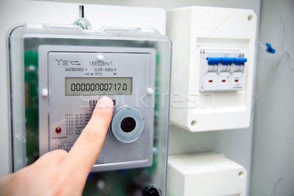 Stock photo: Modern electric meter close up view