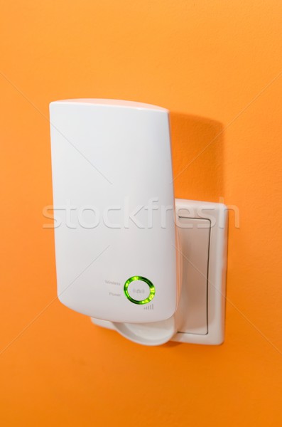 WiFi repeater in electrical socket. Simply way to extend wireles Stock photo © simpson33
