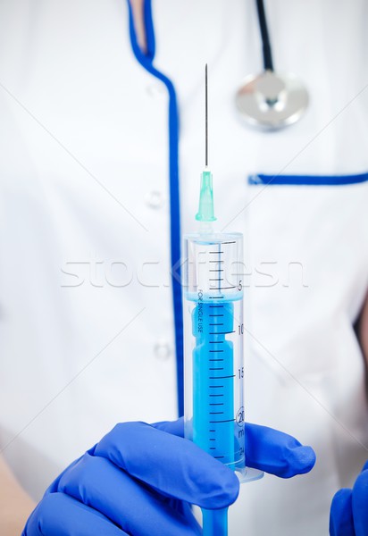 женщину врач перчатки медицинской инъекций Сток-фото © simpson33